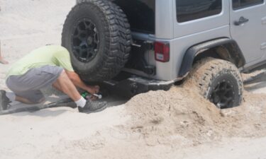 A  group of volunteers is helping beachgoers whose vehicles get stuck in the sand on Corpus Christi and Padre Island beaches for free.