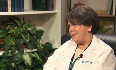 Idalina Colburn works on the eighth floor at the Dana-Farber Cancer Institute in Boston helping cancer patients navigate their complicated treatment plans. It's something she understands firsthand because on most Thursdays