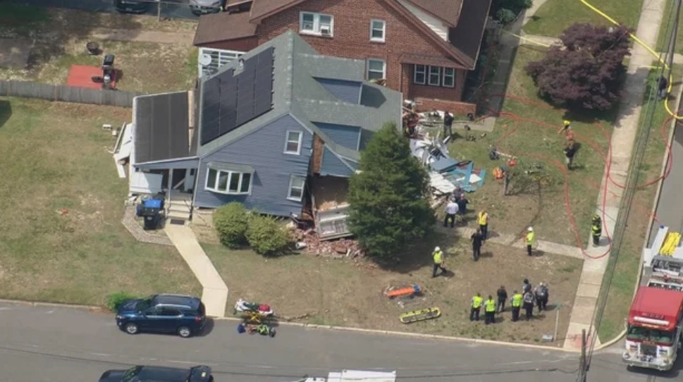 <i>KYW via CNN Newsource</i><br/>The driver of a dump truck was removed safely after slamming into a home in Gloucester County