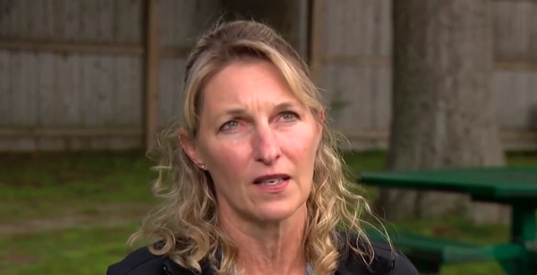 <i>WCVB via CNN Newsource</i><br/>Julie Blaney was just behind the two-car crash on Grove Street in Franklin on May 24 and rushed over to the car. Blaney said she found a father
