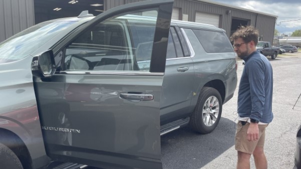 <i>WCPO via CNN Newsource</i><br/>John Tibbs looks at the used Suburban he bought