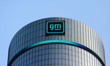 The new GM logo is seen on the facade of the General Motors headquarters in Detroit.