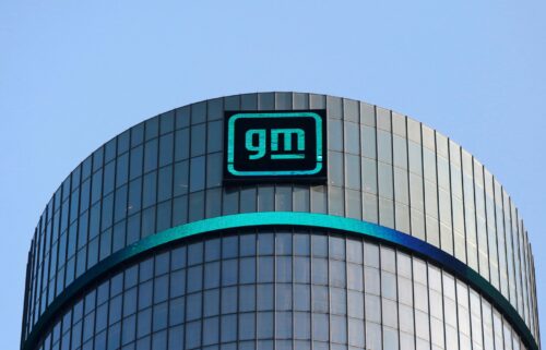 The new GM logo is seen on the facade of the General Motors headquarters in Detroit.