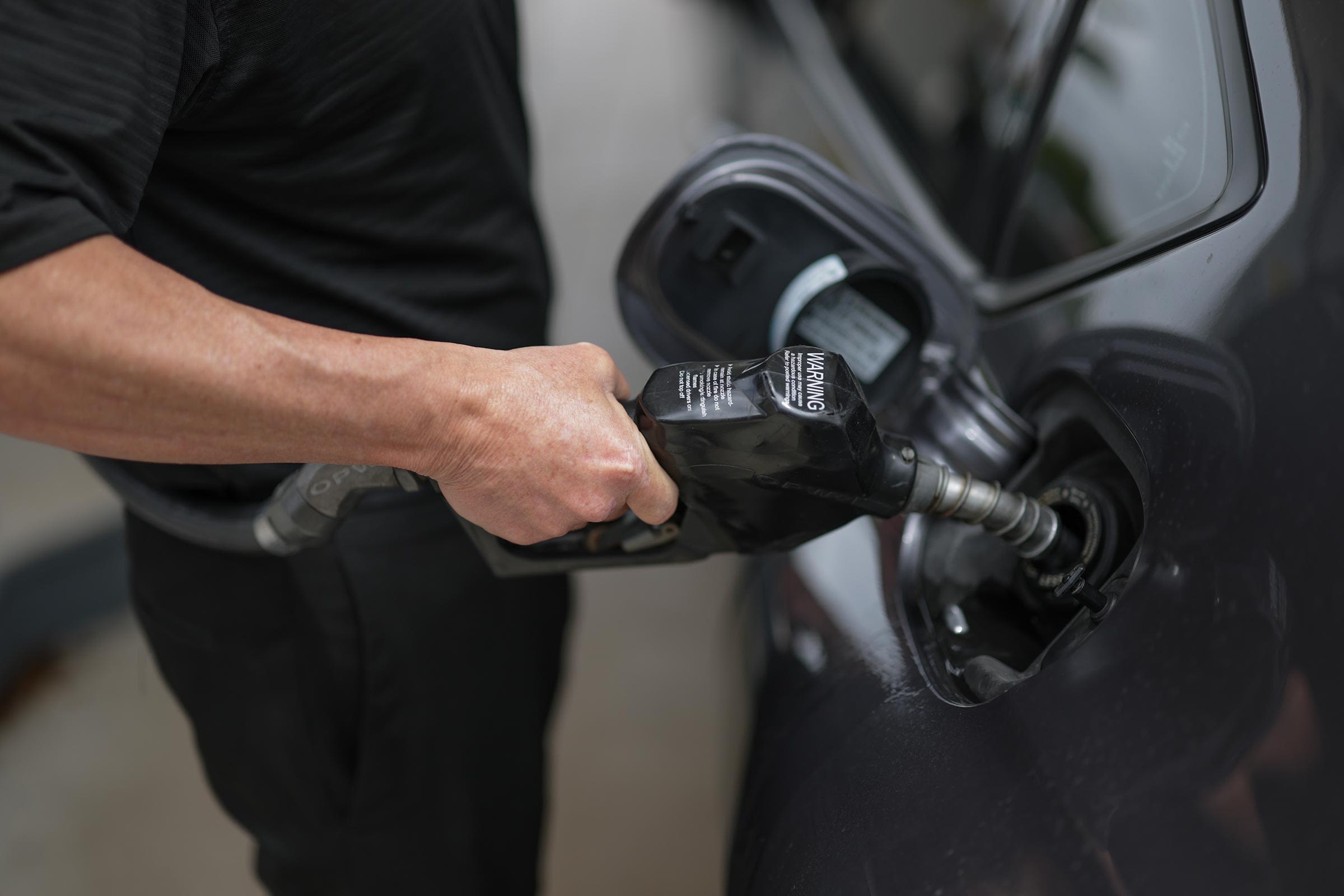 <i>Joe Raedle/Getty Images via CNN Newsource</i><br/>A customer pumps gas into their vehicle at a Shell station on April 10