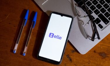 The Zelle logo is displayed on a smartphone in February 2024.