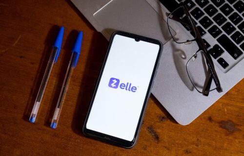The Zelle logo is displayed on a smartphone in February 2024.