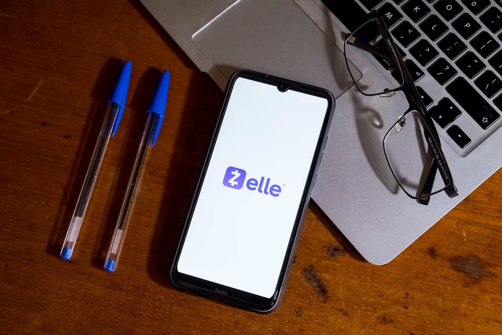 <i>Nikolas Kokovlis/NurPhoto/Getty Images via CNN Newsource</i><br/>The Zelle logo is displayed on a smartphone in February 2024.
