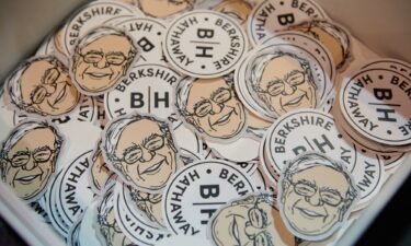 Berkshire-themed stickers on the exhibition floor inside the CHI Health Center during the Berkshire Hathaway annual shareholders meeting in Omaha