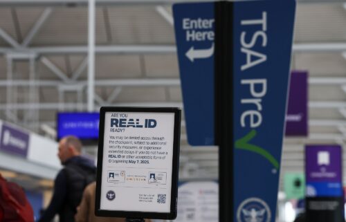 A sign outside a TSA checkpoint at Chicago O'Hare International Airport informs travelers of the REAL ID deadline.
