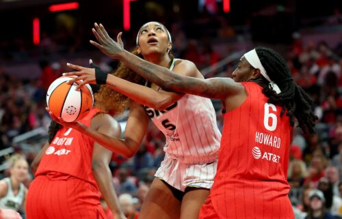 Angel Reese (center) had 12 points and 17 rebounds in the Chicago Sky's loss to the Indiana Fever on Saturday.