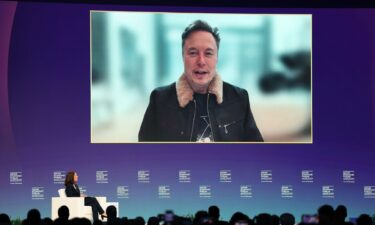Elon Musk speaks Tuesday at the Qatar Economic Forum in Doha.