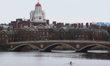 A sculler rows down the Charles River near Harvard University on April 15