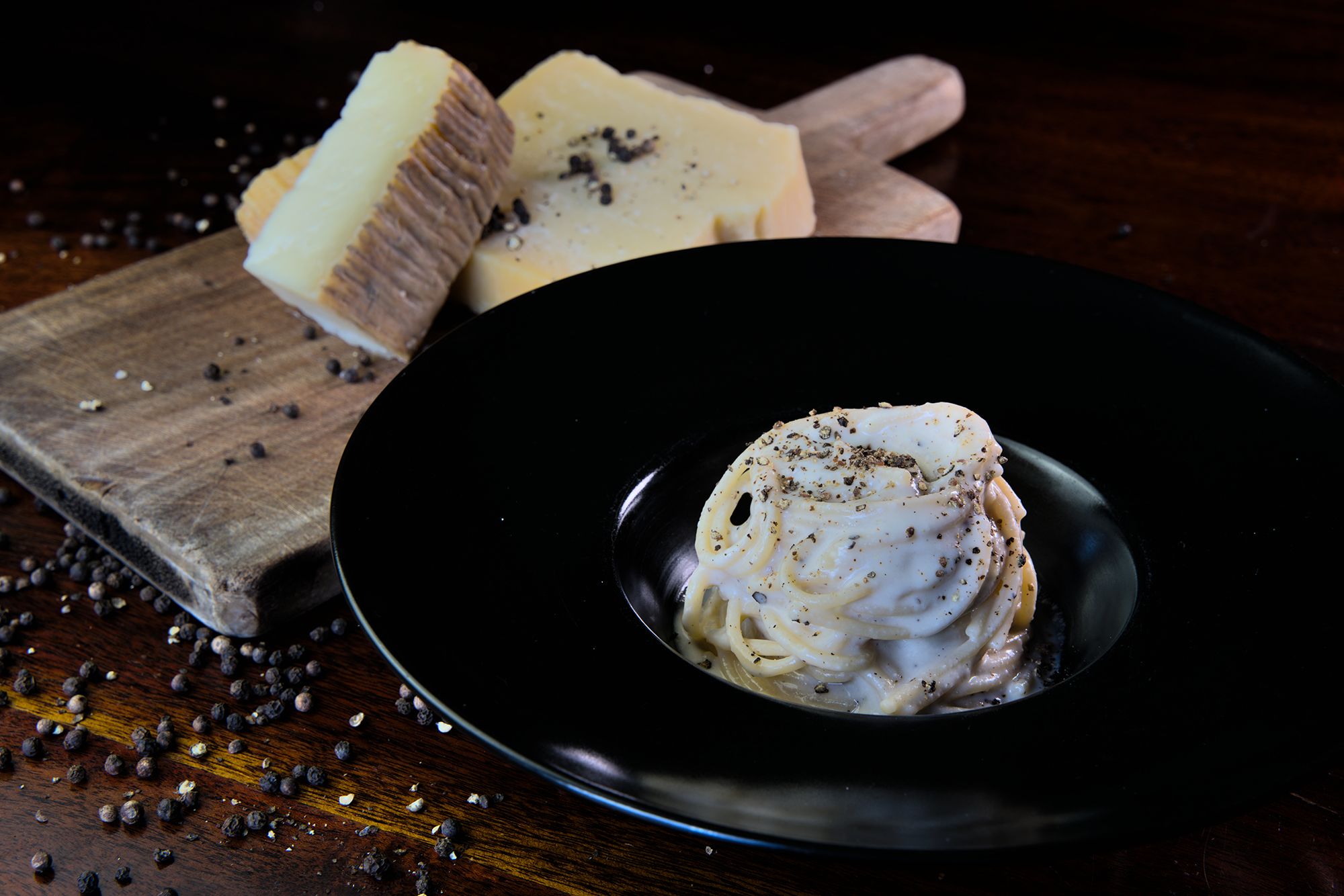 <i>University of Padua via CNN Newsource</i><br/>Study coauthor Daniel Maria Busiello of the University of Padova adds the pecorino cream to the pasta. The secret to the cream's smooth consistency? The unconventional addition of cornstarch.