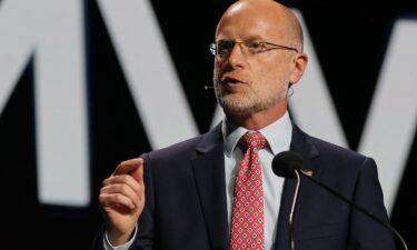 Federal Communications Commission Chair Brendan Carr delivers a speech during Mobile World Congress fair in Barcelona on March 3. Carr doesn’t view his investigation into CBS as “a threat” to the broadcaster.