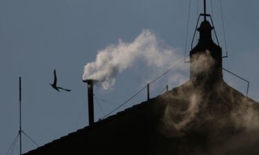 White smoke rises from the chimney on the Sistine Chapel