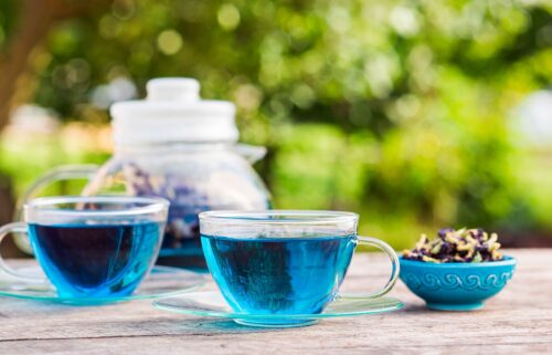 The flower petals of the butterfly pea flower plant provide a vibrant blue hue to foods and beverages.