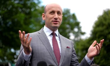 White House deputy chief of staff for policy Stephen Miller speaks to the media outside the White House in Washington