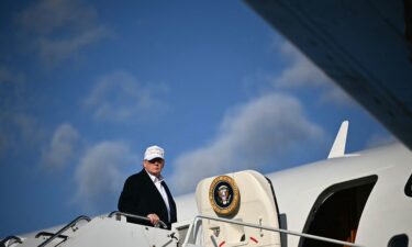 US President Donald Trump boards Air Force One upon departure at Morristown Municipal Airport in Morristown