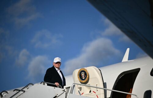 US President Donald Trump boards Air Force One upon departure at Morristown Municipal Airport in Morristown
