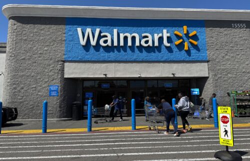 Customers enter a Walmart store on April 9
