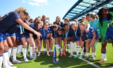 Chelsea players celebrate winning the WSL trophy this season.