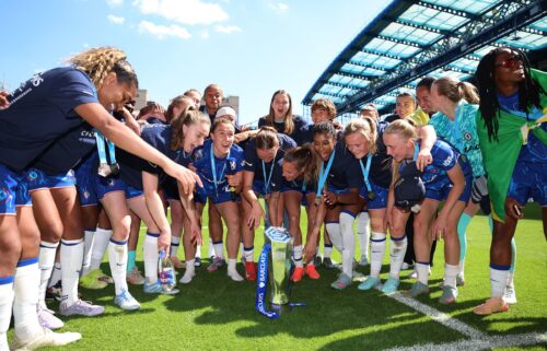 Chelsea players celebrate winning the WSL trophy this season.