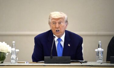 President Donald Trump attends a business meeting and roundtable at Qasr Al Watan in Abu Dhabi
