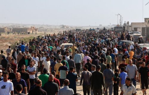 Palestinians gather near an aid distribution site run by the US-backed Gaza Humanitarian Foundation in Rafah