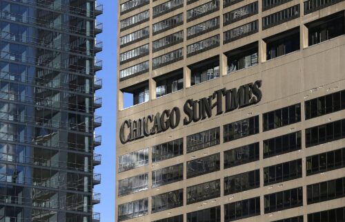 The Chicago Sun-Times building is seen here in Chicago in March 2016. Newsrooms have adopted AI chatbots with some trepidation