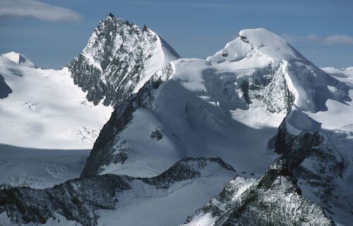 The snow-capped peaks of Rimpfischhorn (left) and Allalinhorn are pictured in the Valais Alps