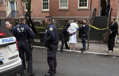 New York police officers arrest John Woeltz on May 23 in New York.