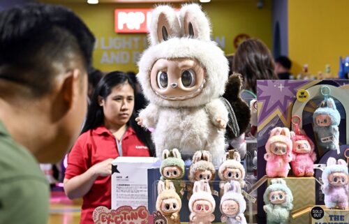People look at Labubu collectable toys at a Pop Mart pop-up store in Siam Center shopping mall in Bangkok on May 6.
