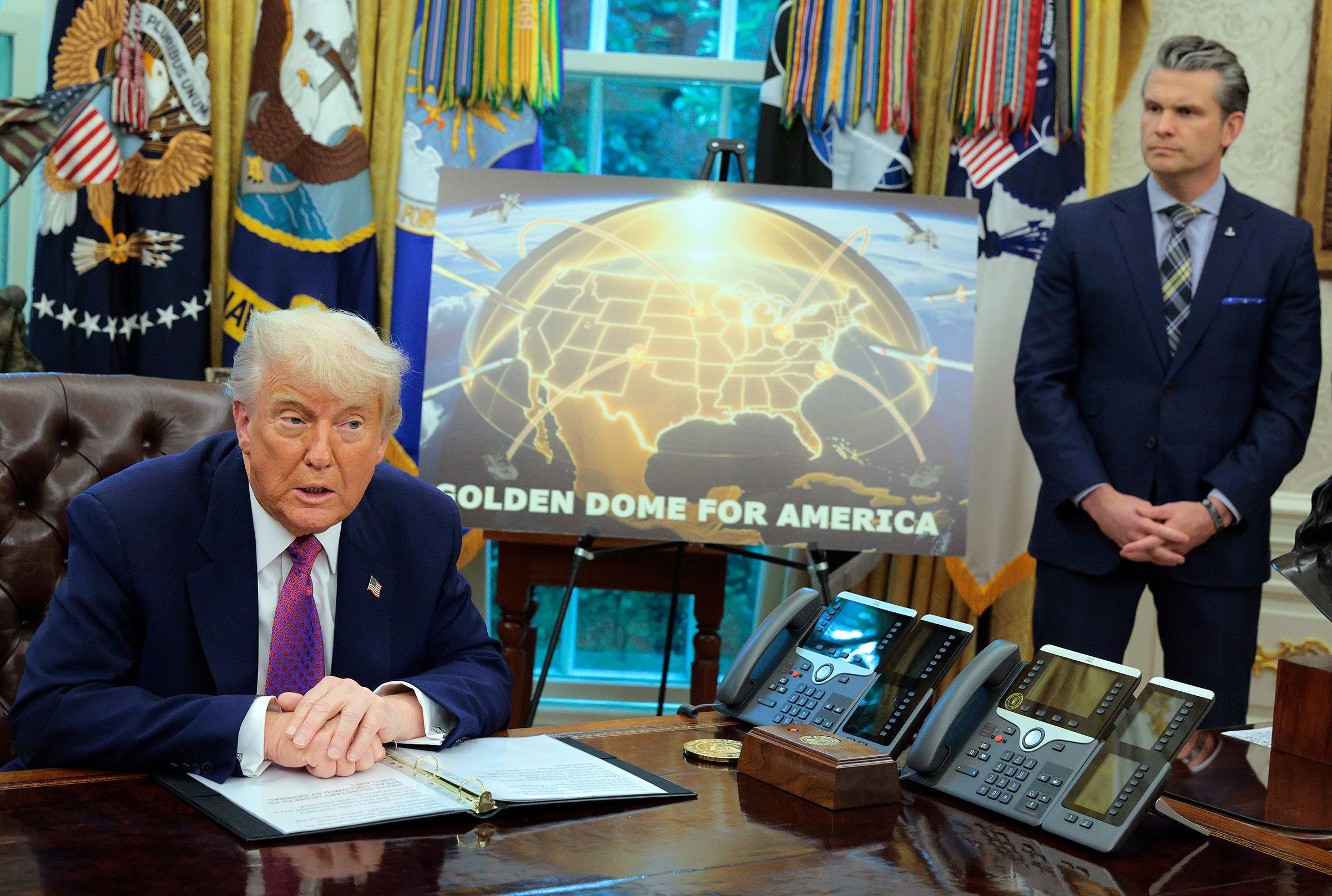 <i>Chip Somodevilla/Getty Images via CNN Newsource</i><br/>President Donald Trump speaks alongside Secretary of Defense Pete Hegseth in the Oval Office at the White House on May 20 in Washington