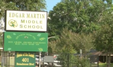 A recently surfaced video from about a year ago shows a staff member sitting on a student at Edgar Martin Middle School in Lafayette while another staffer slaps the student on the head.