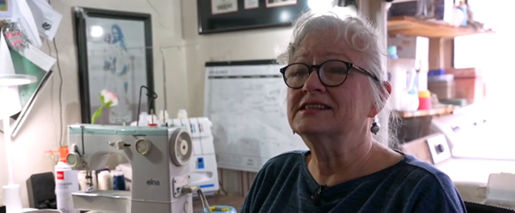 <i>KGUN via CNN Newsource</i><br/>Teresa Burns makes sure graduates are ready to cross that stage by turning fabric into memories.