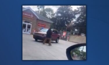 A 41-year-old man is behind bars for allegedly attacking another man at an Akron gas station and then hitting and dragging him with a vehicle.