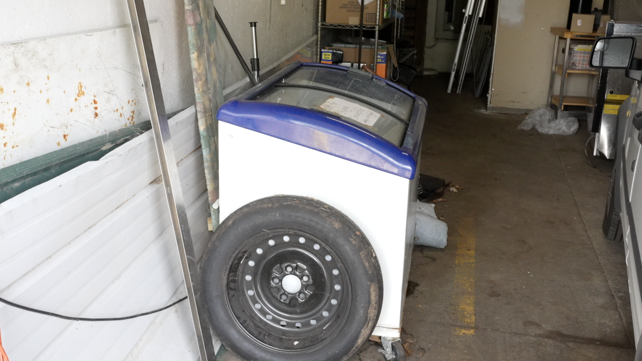 <i>Olivia Pageau/WSYM via CNN Newsource</i><br/>A freezer where a dead dog was found on Tuesday morning