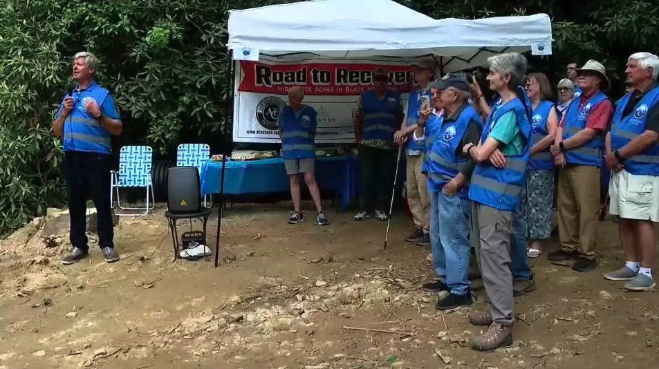 <i>WLOS via CNN Newsource</i><br/>High Rock Acres community members celebrated the start of road repair and recovery eight months after Hurricane Helene. The Black Mountain community was cut off for more than a week after the storm.