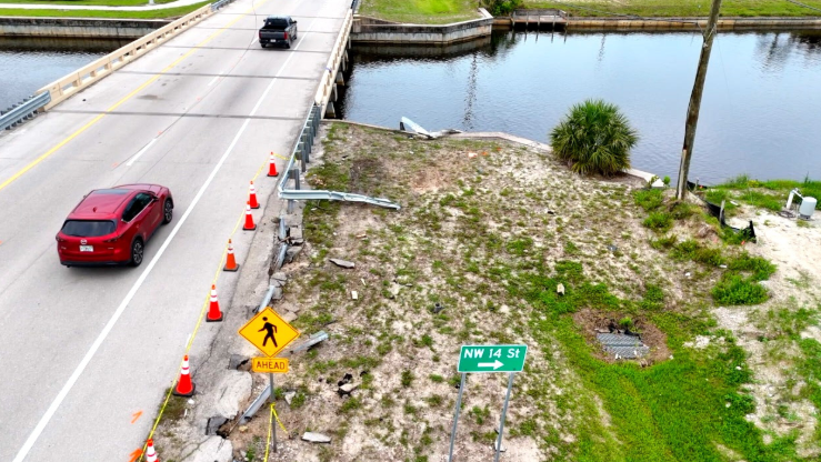 <i>WFTX via CNN Newsource</i><br/>Smashed guardrails leading to the canal