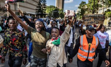 Protesters chant anti-government slogans as they march to the National Police Service headquarters demanding the resignation of senior officers following the death of Albert Ojwang in police custody.