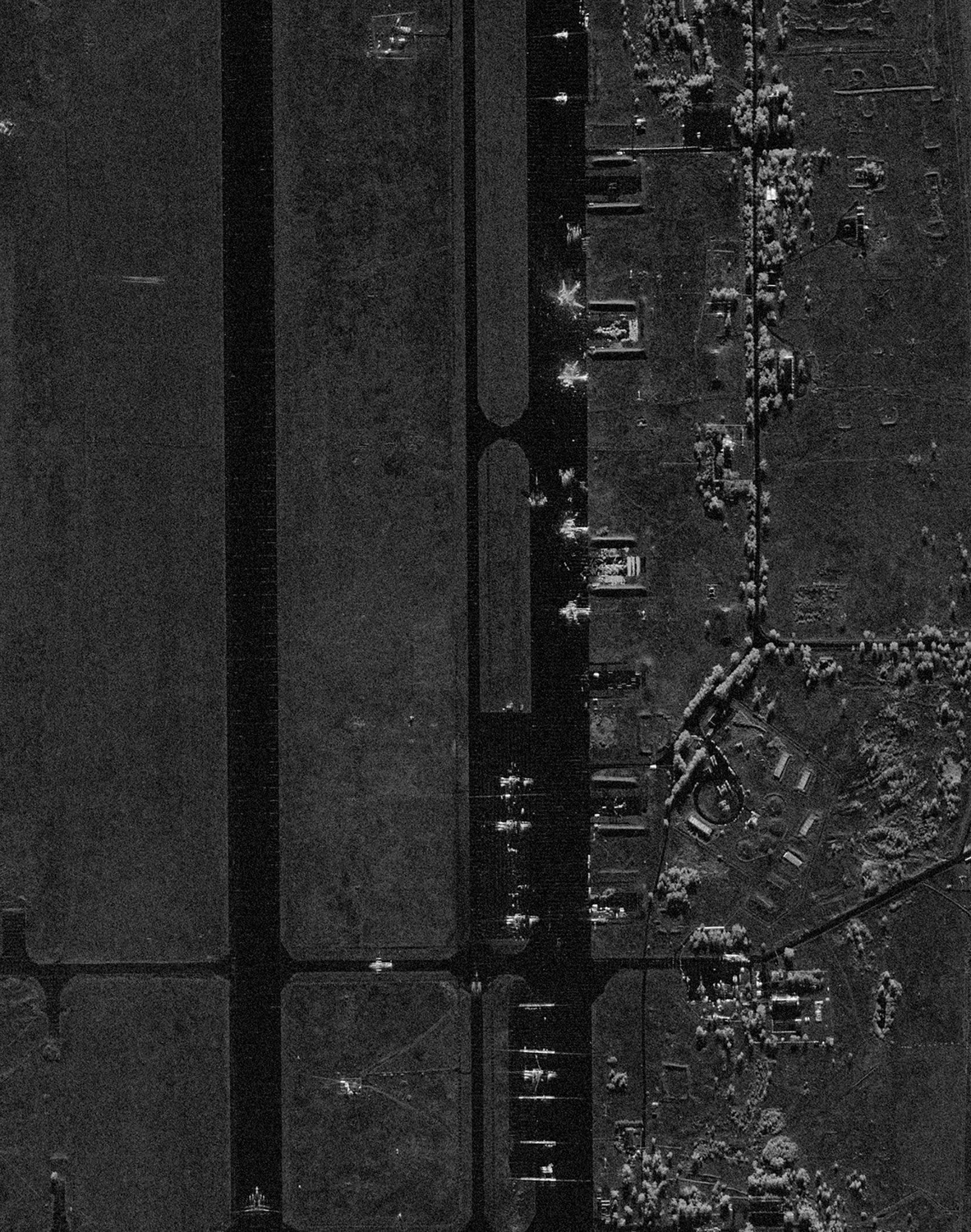A satellite image shows damage to aircraft at an airfield following the Ukrainian drone attack in Stepnoy