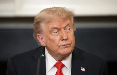 President Donald Trump attends a meeting with the Fraternal Order of Police in the State Dinning Room of the White House