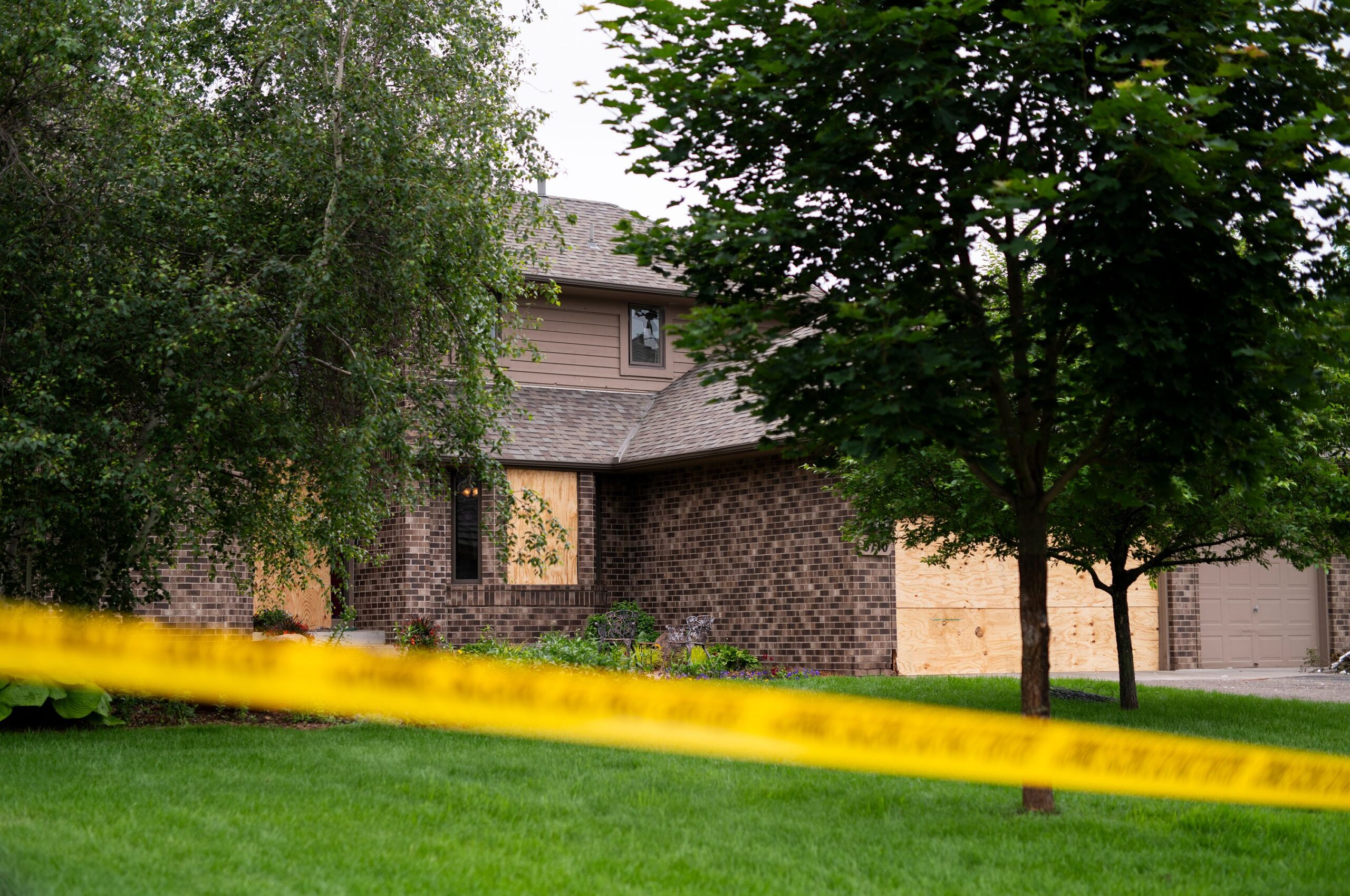 <i>WCCO via CNN Newsource</i><br/>Police are seen outside of Rep. Melissa Hortman's home in Brooklyn Park