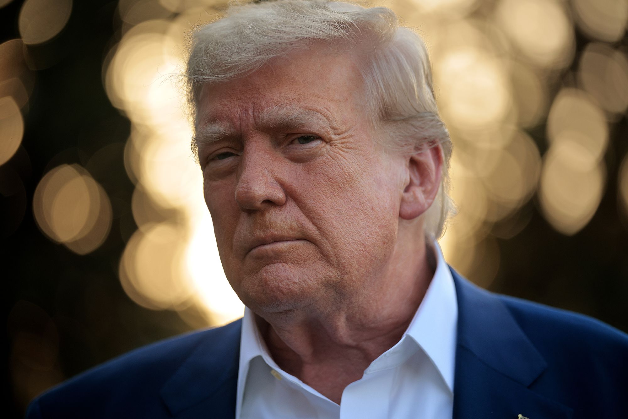 <i>Chip Somodevilla/Getty Images via CNN Newsource</i><br/>President Donald Trump speaks to reporters before boarding the Marine One presidential helicopter and departing the White House on June 24