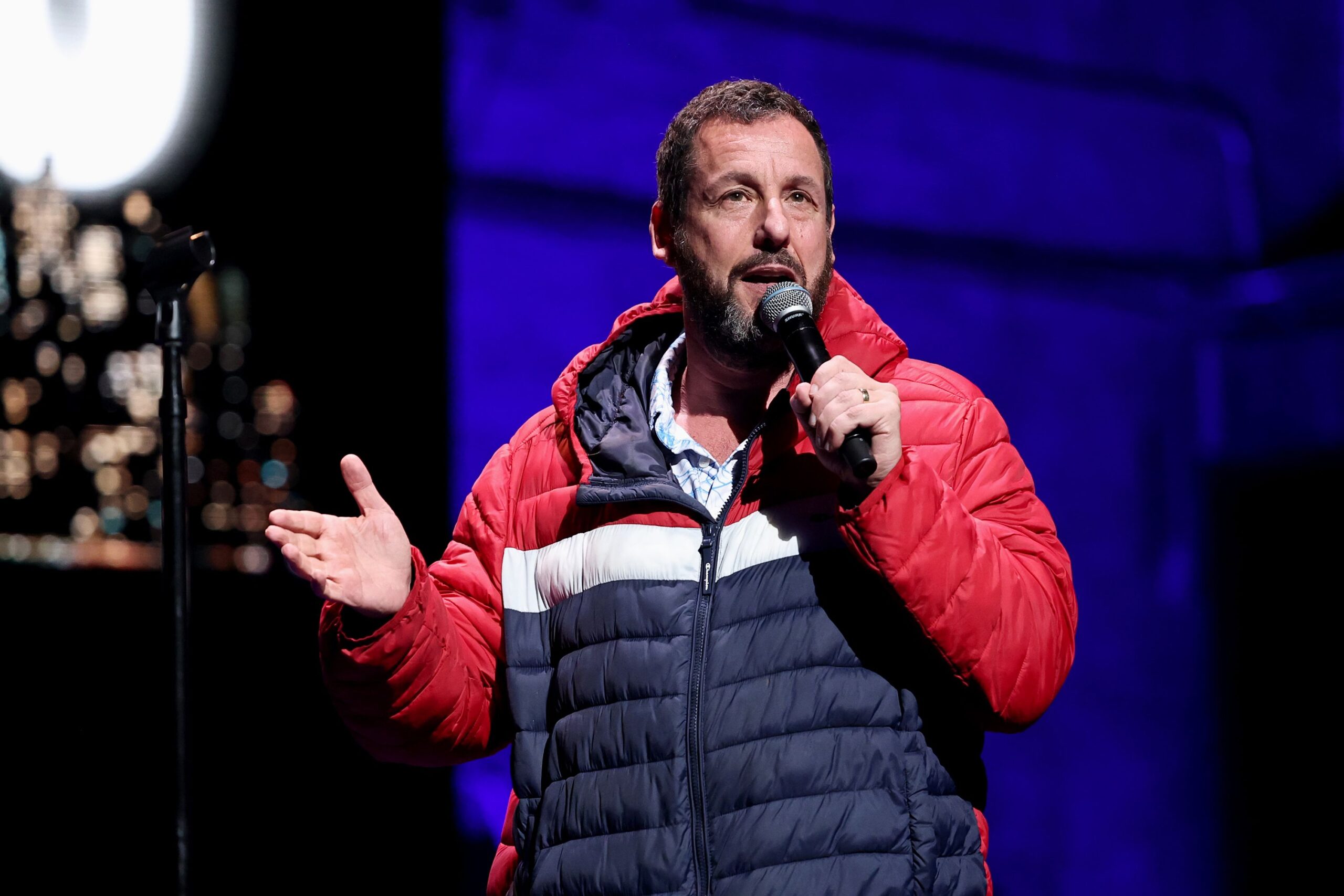 <i>Jamie McCarthy/Getty Images via CNN Newsource</i><br/>Adam Sandler on stage in New York City in March.