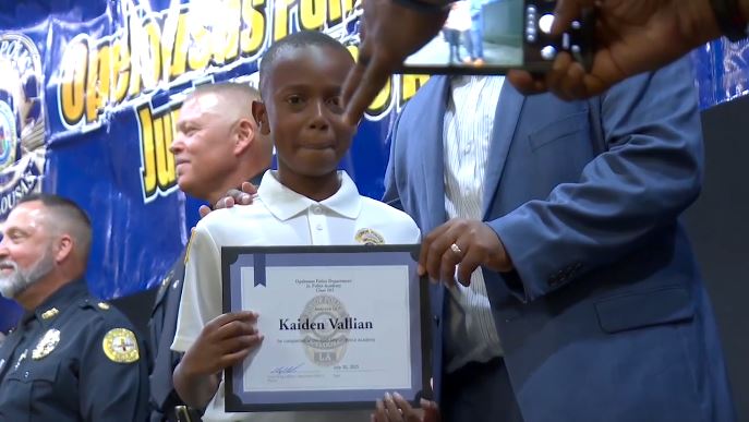 <i>KATC via CNN Newsource</i><br/>Kaiden stood proud as he marched across the stage