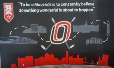 Brent Bean and Alexis Sharkey have been attending Omaha hockey games for 10 years. Their love for the program prompted them to have a mural painted in their home... twice.