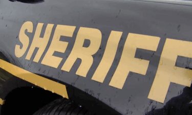 A 38-year-old Pontiac father has been charged with child abuse after police say he choked one of his sons and threw his infant son into his crib.