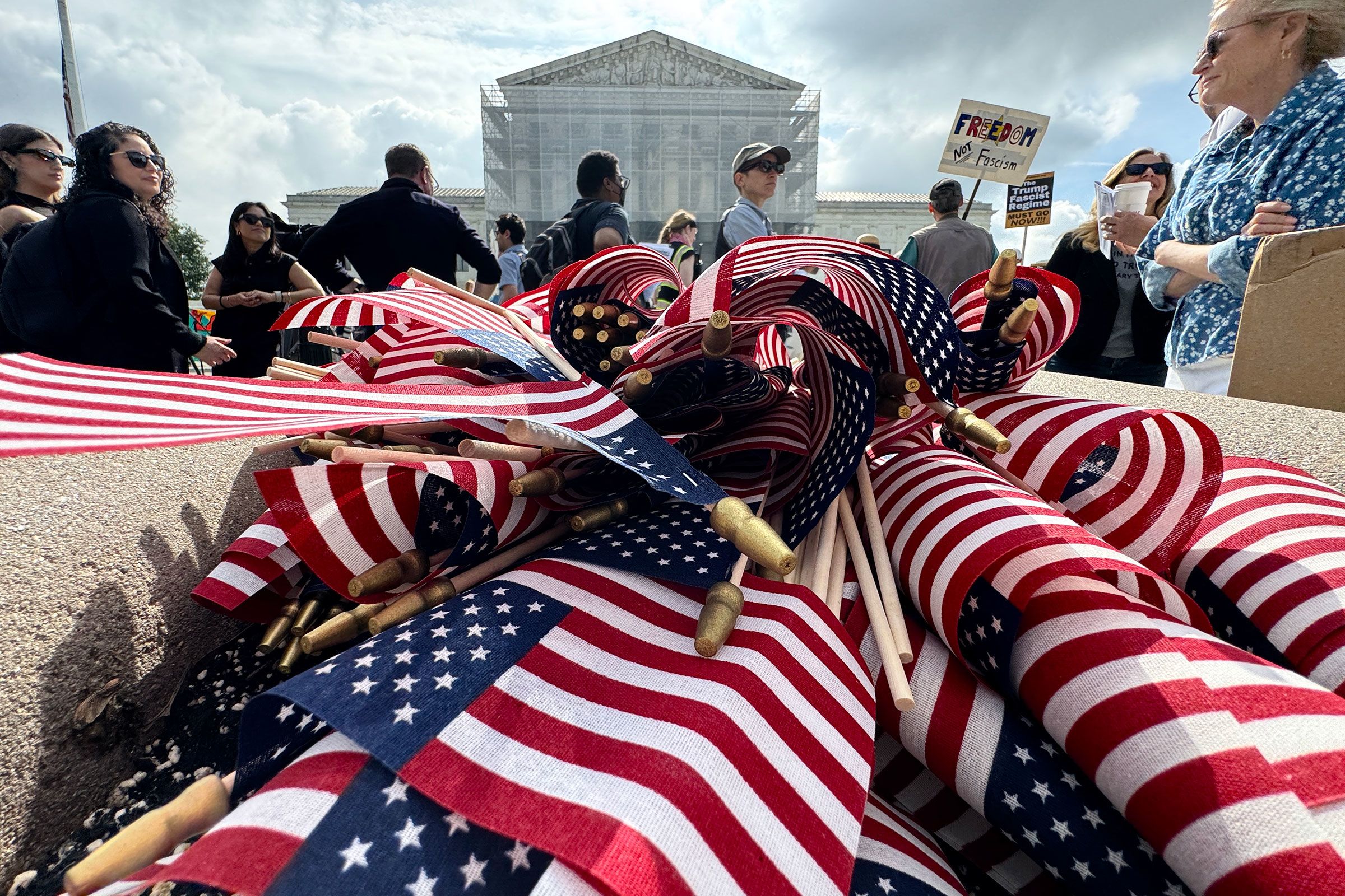 <i>Drew Angerer/AFP/Getty Images via CNN Newsource</i><br/>American flags are seen during a protest outside the US Supreme Court over President Donald Trump's move to end birthright citizenship as the court hears arguments over the order in Washington