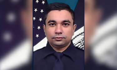 People paying tribute outside Manhattan’s Presbyterian/Weill Cornell Medical Center as the body of Officer Didarul Islam was transferred on Tuesday.